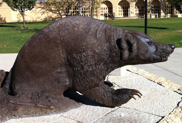 Bronze badger statue in front of entrance to Camp Randall Stadium.