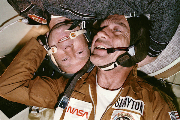 Deke Slayton with cosmonaut Alexey Leonov in the Soyuz spacecraft.